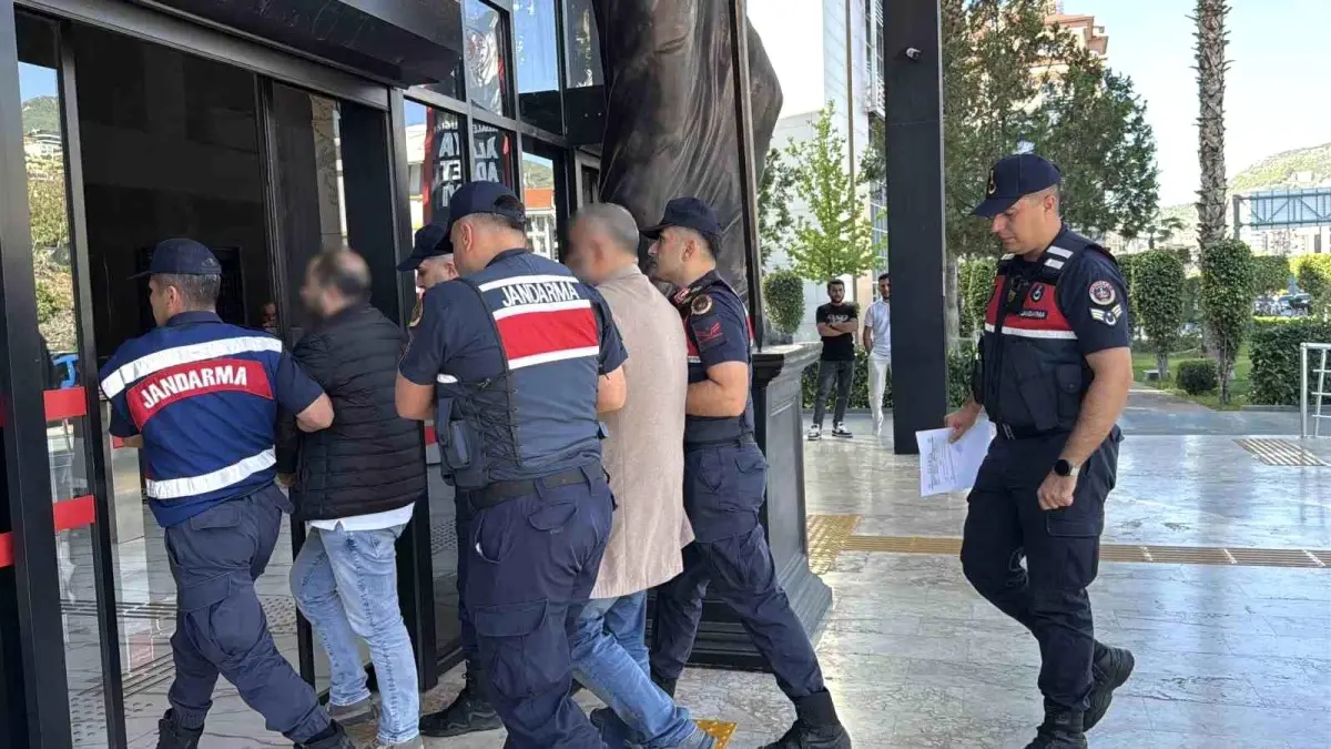 sahte pasaportla dolandiricilik operasyonu gsv39nK2.jpg